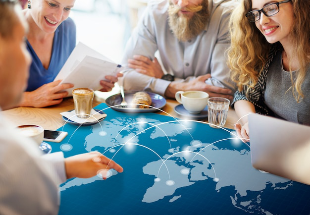 Foreign entrepreneurs discussing compliance requirements for starting a business in Saudi Arabia