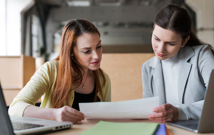 women looking at Australian academic transcript