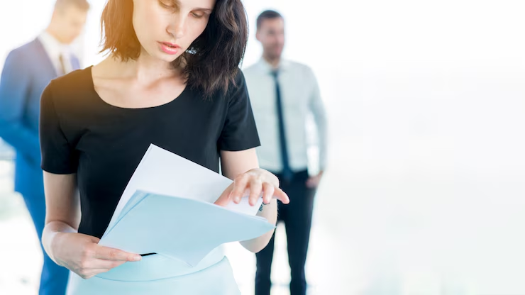 Business owner preparing Australian company constitution for attestation before expanding into Qatar