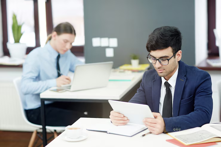 Man checking Authentifier’s online portal for document tracking updates