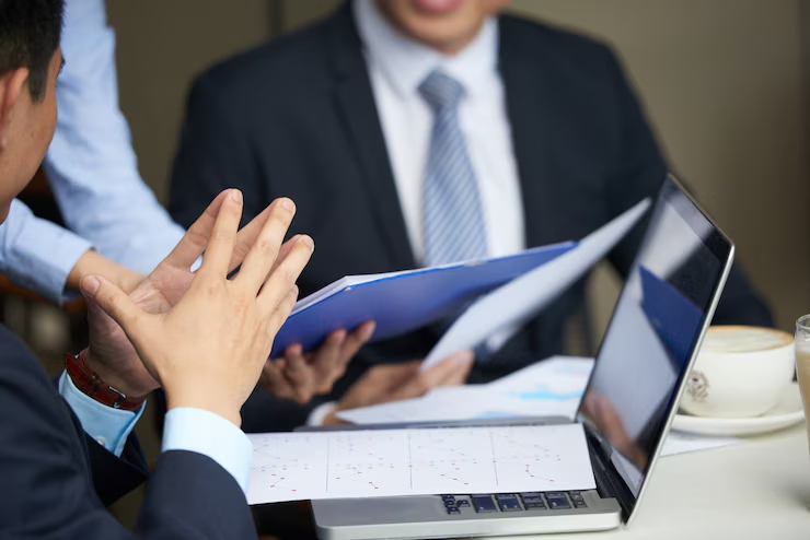Authentifier legal experts reviewing business documents for UAE compliance