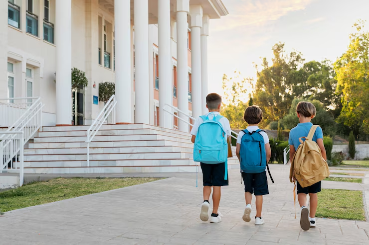 Children carrying school bags walking in Riyadh, Saudi Arabia