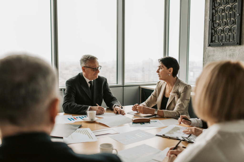 A picture of people during a meeting