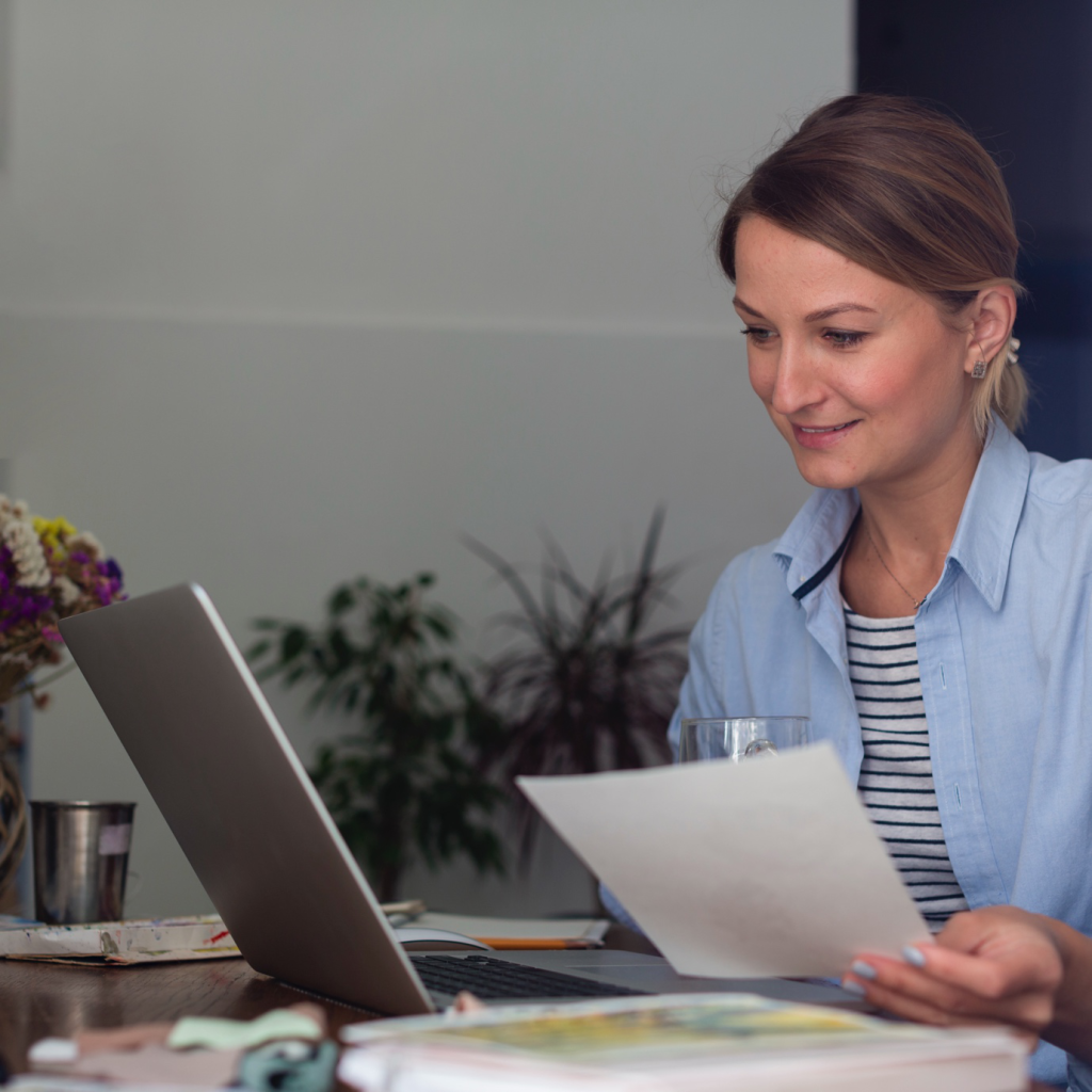 An expert from Authentifier reviewing a client's official documents.