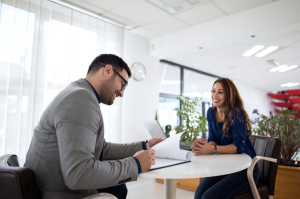 An Australian doctor meeting with a professional from Authentifier to discuss the Apostille process.